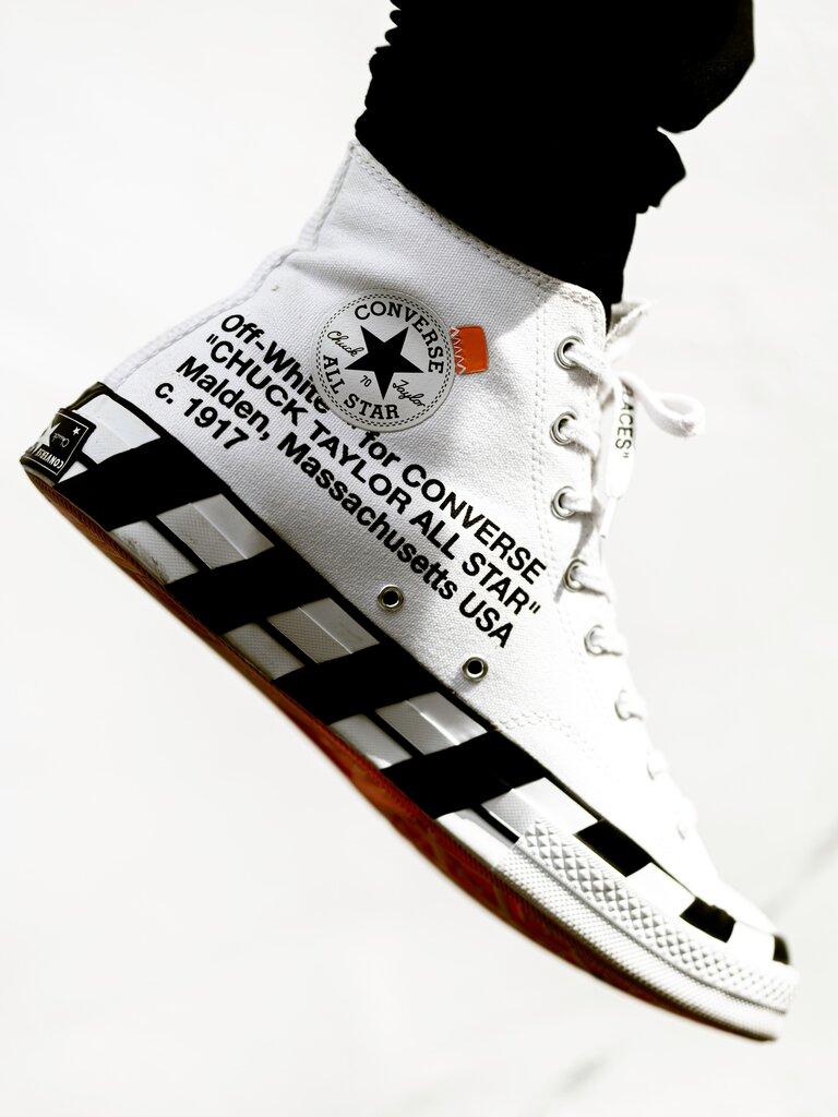 Weiße und schwarze Converse All Star High Top Sneakers